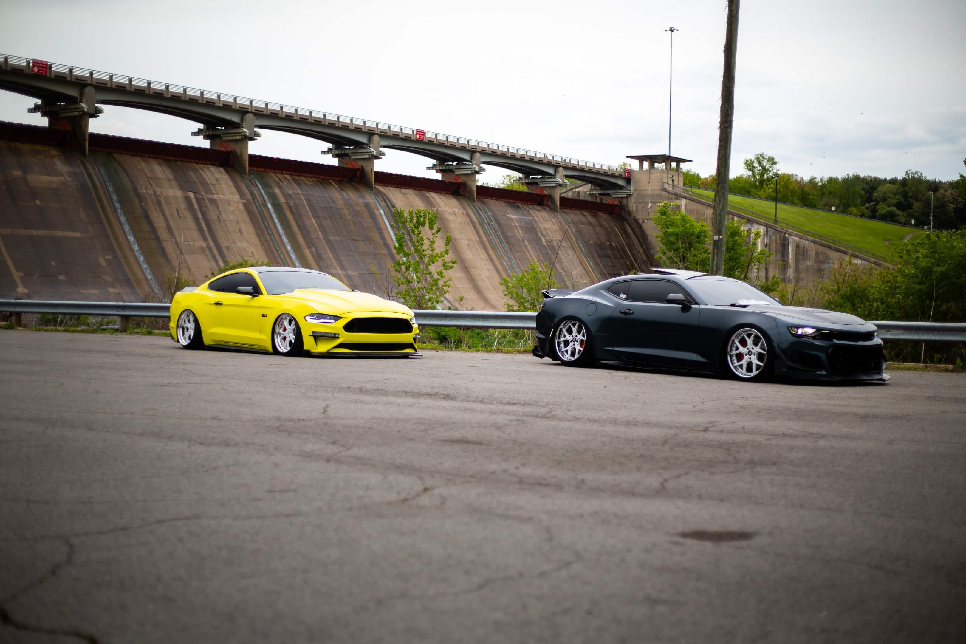 Yellow Mustang and bagged Camaro — stature.tm — Welchiani Media