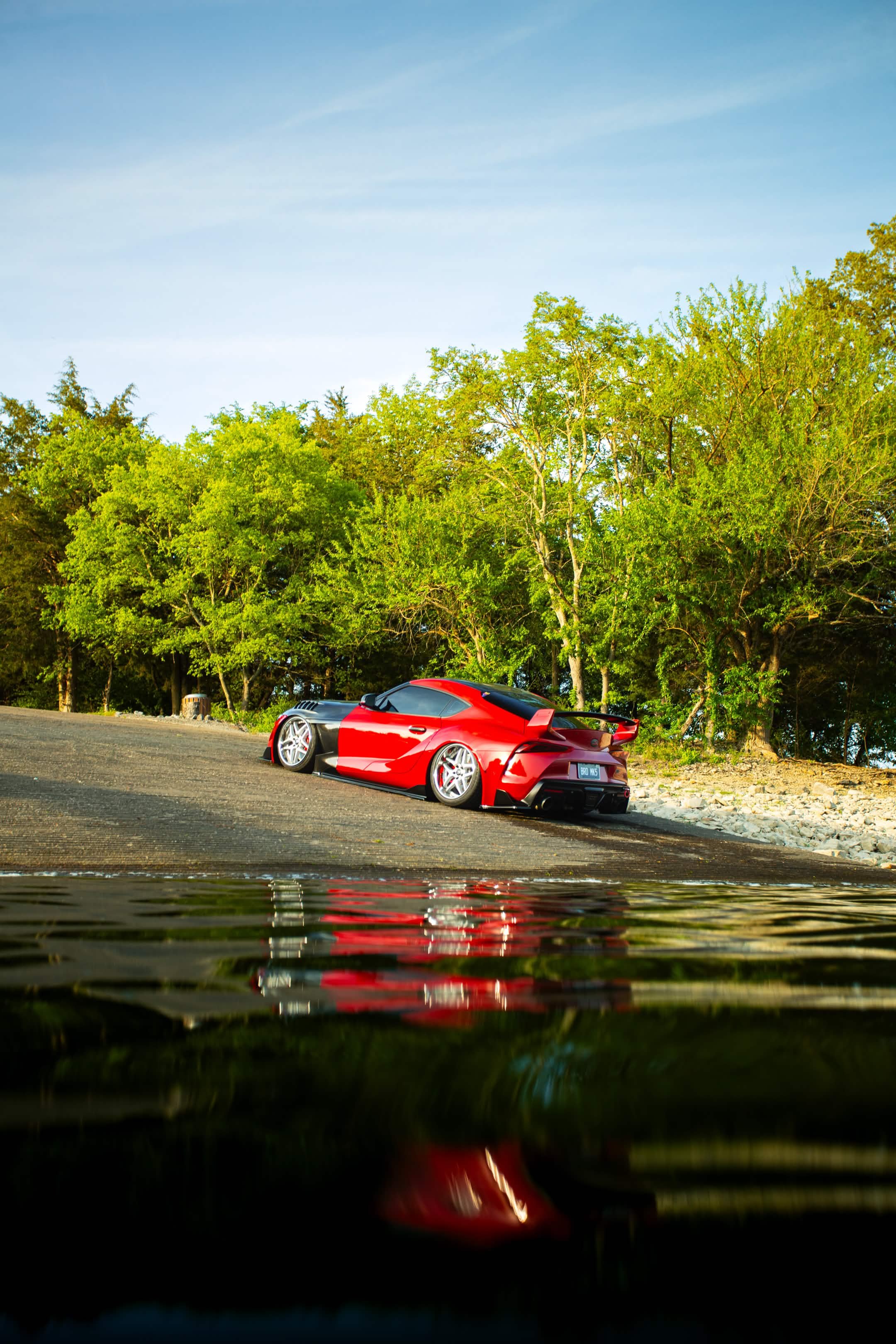Red Toyota GR Supra MK5 beardedmk5 stature.tm waterfront — Welchiani Media Indianapolis