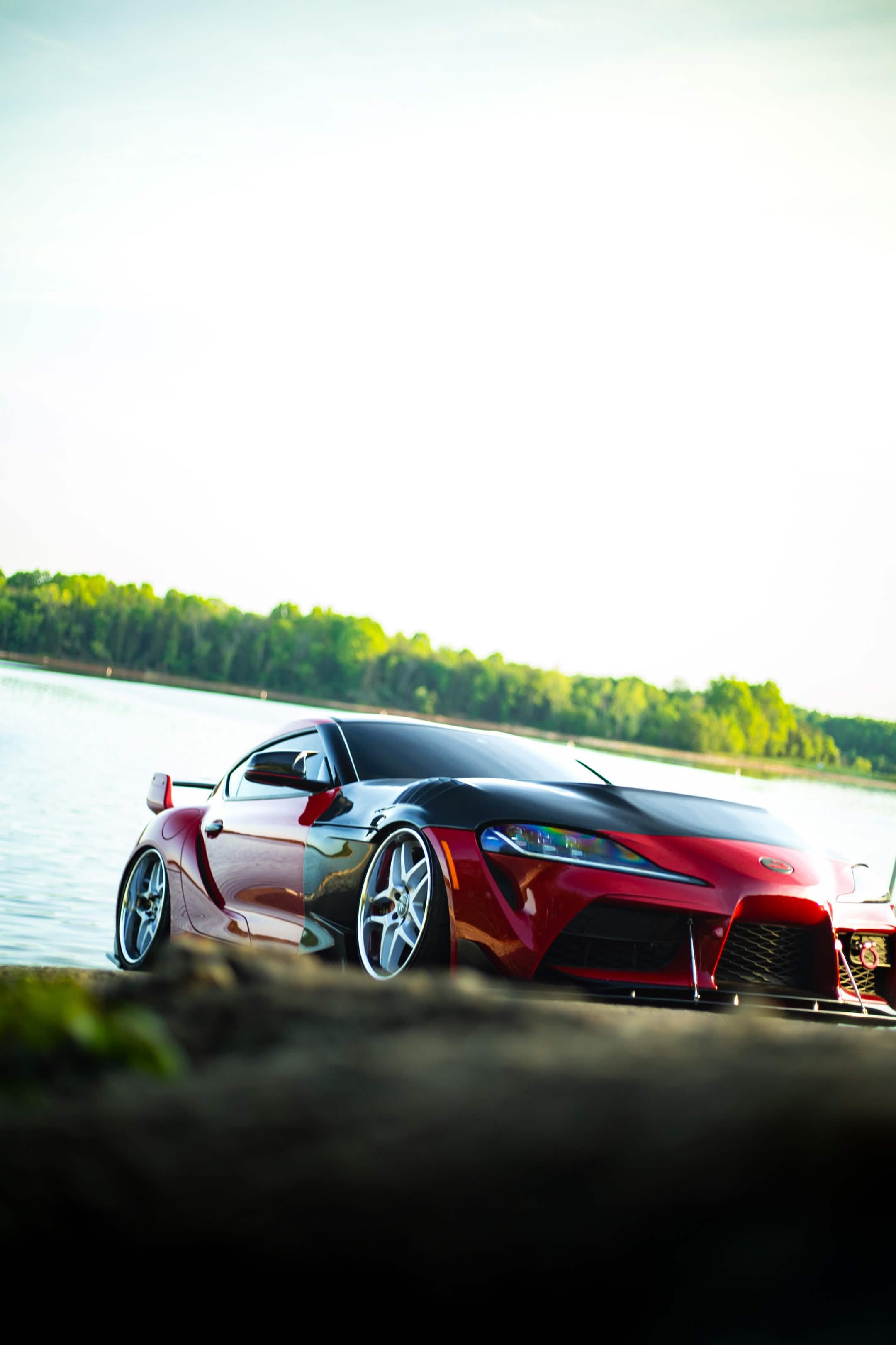Red MK5 Supra beardedmk5 waterfront side view