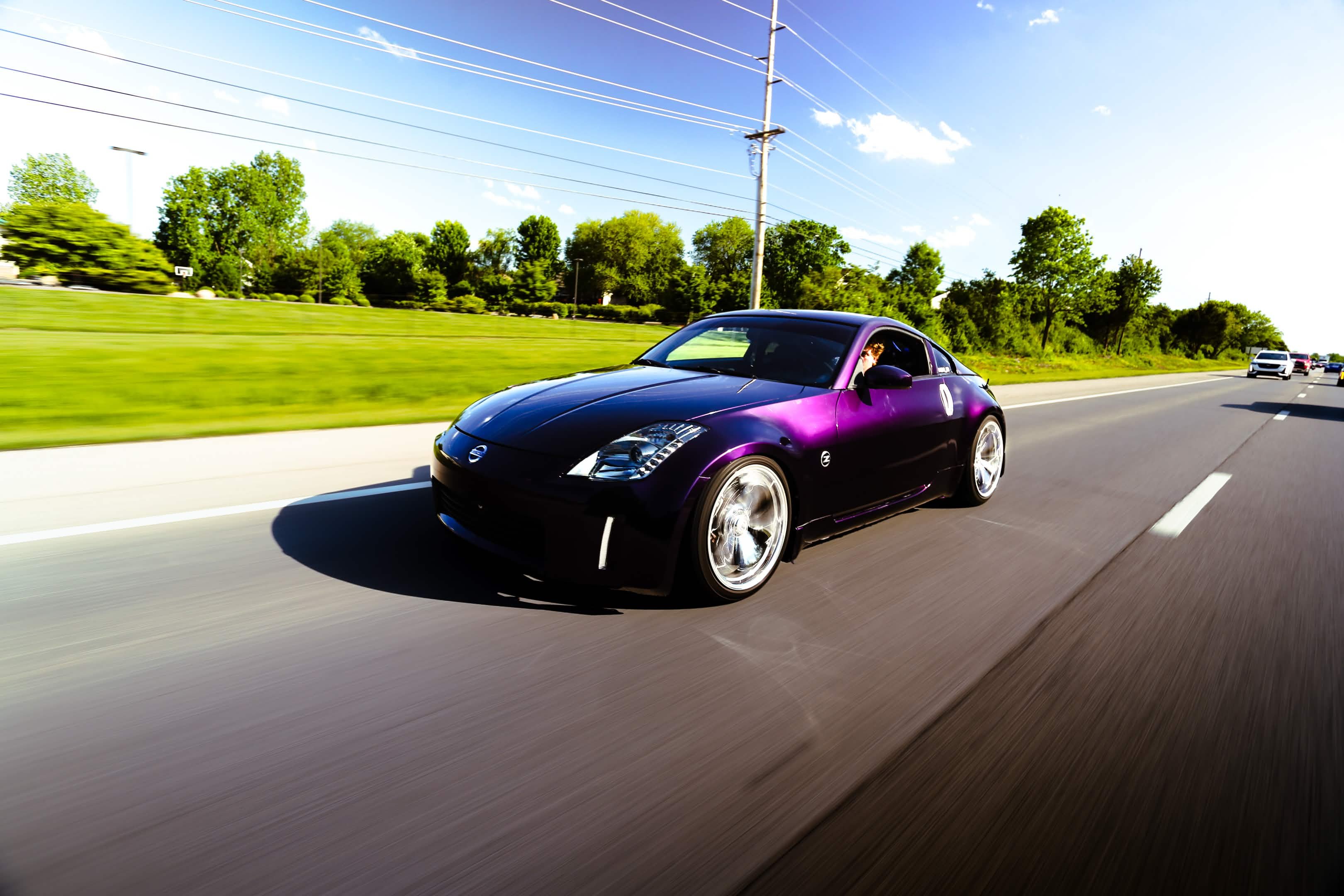 Purple Nissan 350Z rolling highway Indiana Welchiani Media