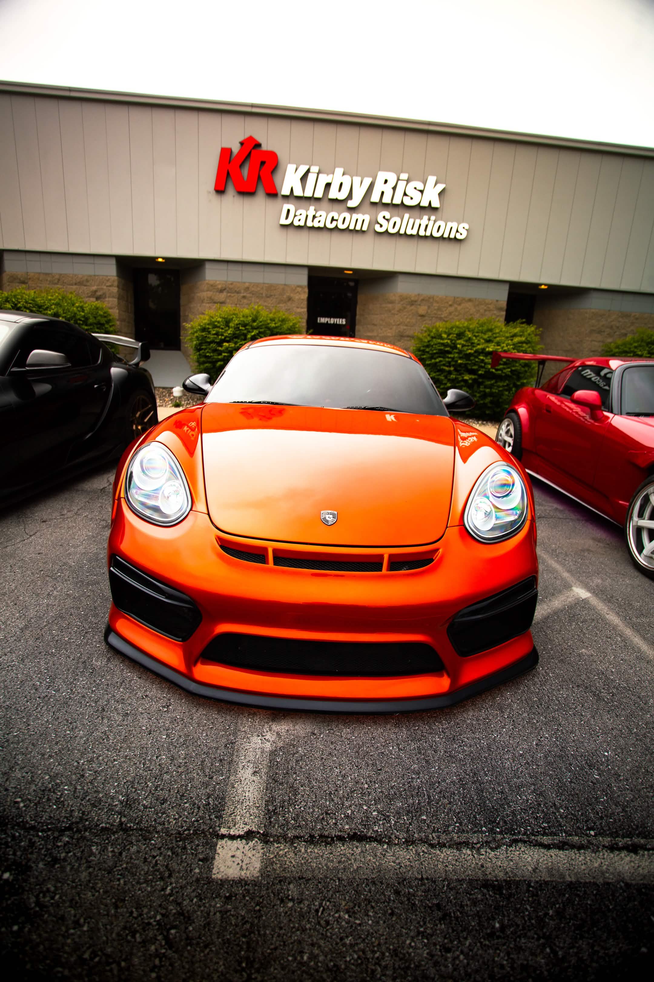Custom orange Porsche 911 Cayman Indianapolis car meet Welchiani Media